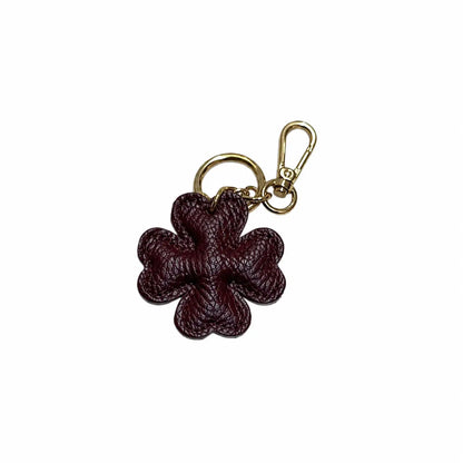 Portachiavi charm borsa quadrifoglio pelle bordeaux