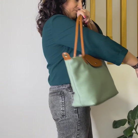 borsa-bottoncina-grande-vera-pelle-video