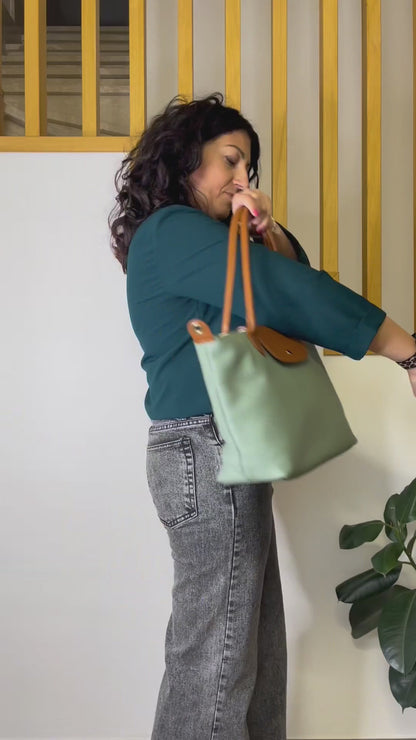 borsa-bottoncina-grande-vera-pelle-video